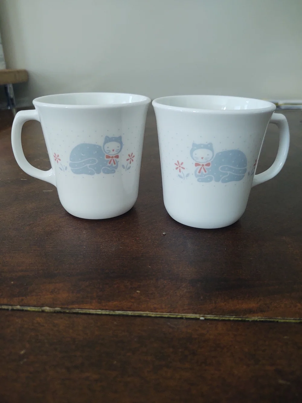 Pair Of Vintage Corningware Mugs In Country Pride Pattern with Blue Cat Motif